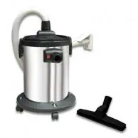 A vacuum cleaner with the handle down and the hose attached.