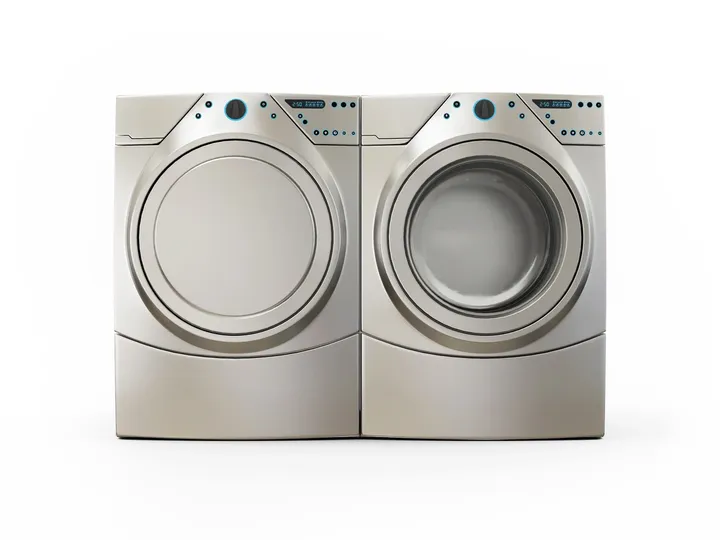 A silver washer and dryer sitting next to each other.
